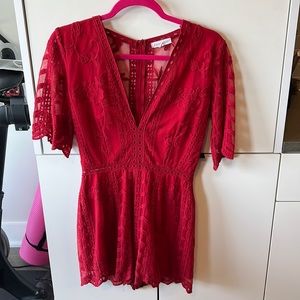 Red lace romper with sheer back